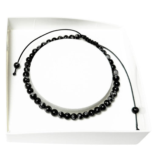 bracciale-in-ossidiana-neve-perle-sferiche-da-4-mm-cordoncino-regolabile