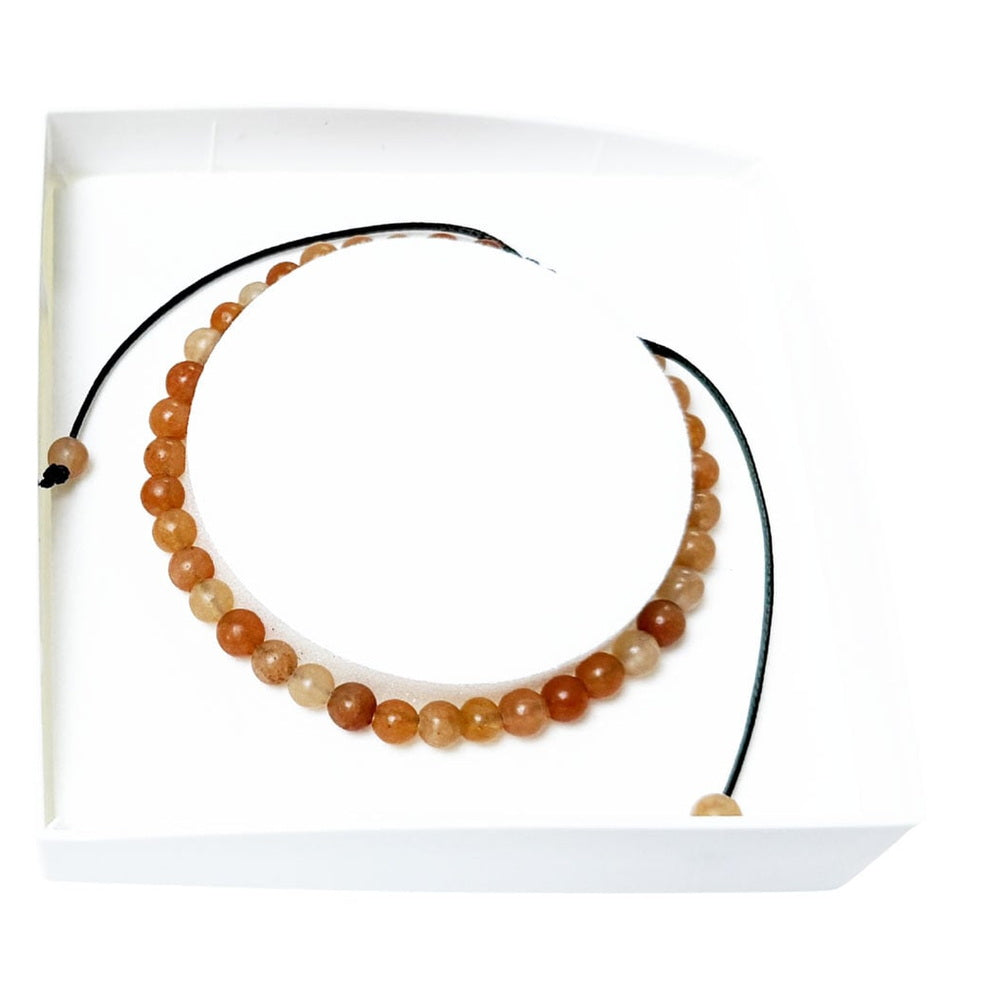 bracciale-in-avventurina-rossa-perle-sferiche-da-4-mm-cordoncino-regolabile