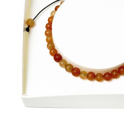 Bracciale in avventurina rossa – Perle sferiche da 4 mm cordoncino regolabile