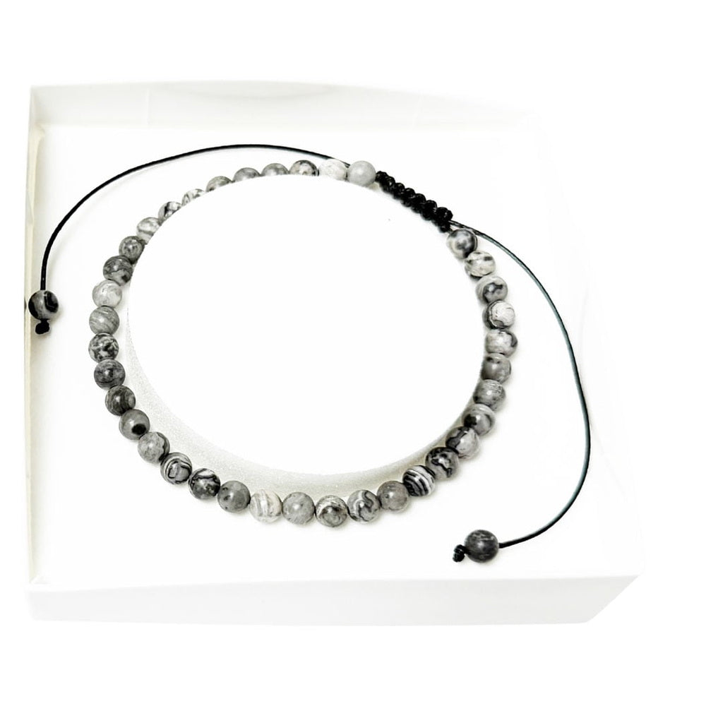 bracciale-in-legno-fossile-perle-sferiche-da-4-mm-cordoncino-regolabile