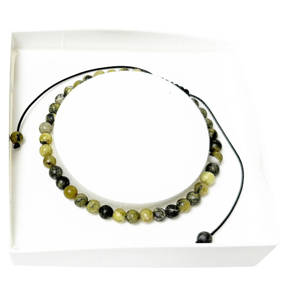 bracciale-in-crisopale-citron-perle-sferiche-da-4-mm-cordoncino-regolabile