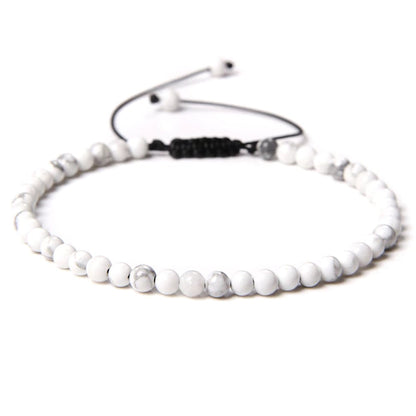 Bracciale in howlite – Perle sferiche da 4 mm cordoncino regolabile