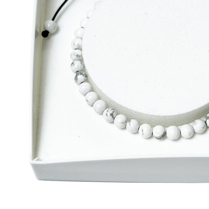 Bracciale in howlite – Perle sferiche da 4 mm cordoncino regolabile