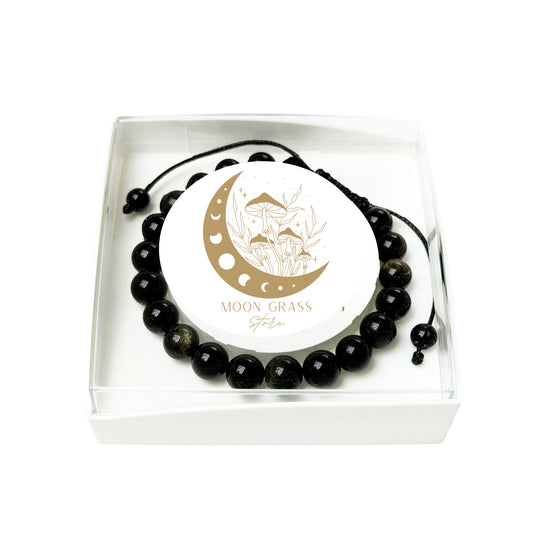 bracciale-in-ossidiana-dorata-perle-sferiche-da-8-mm-cordoncino-regolabile