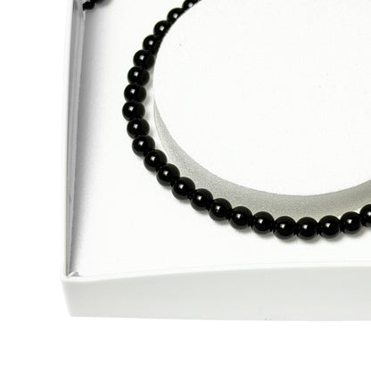 Bracciale in onice – Perle sferiche da 4 mm cordoncino regolabile