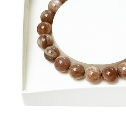 Bracciale in pietra del sole – Perle sferiche da 8 mm cordoncino regolabile
