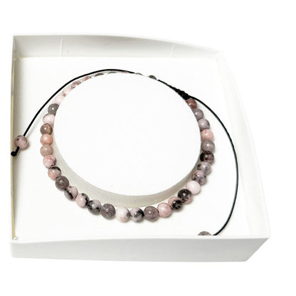 bracciale-in-rodocrosite-perle-sferiche-da-4-mm-cordoncino-regolabile