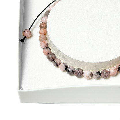 Bracciale in rodocrosite – Perle sferiche da 4 mm cordoncino regolabile