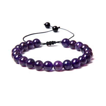 Bracciale in Ametista – cordino regolabile con pietre sferiche da 8 mm