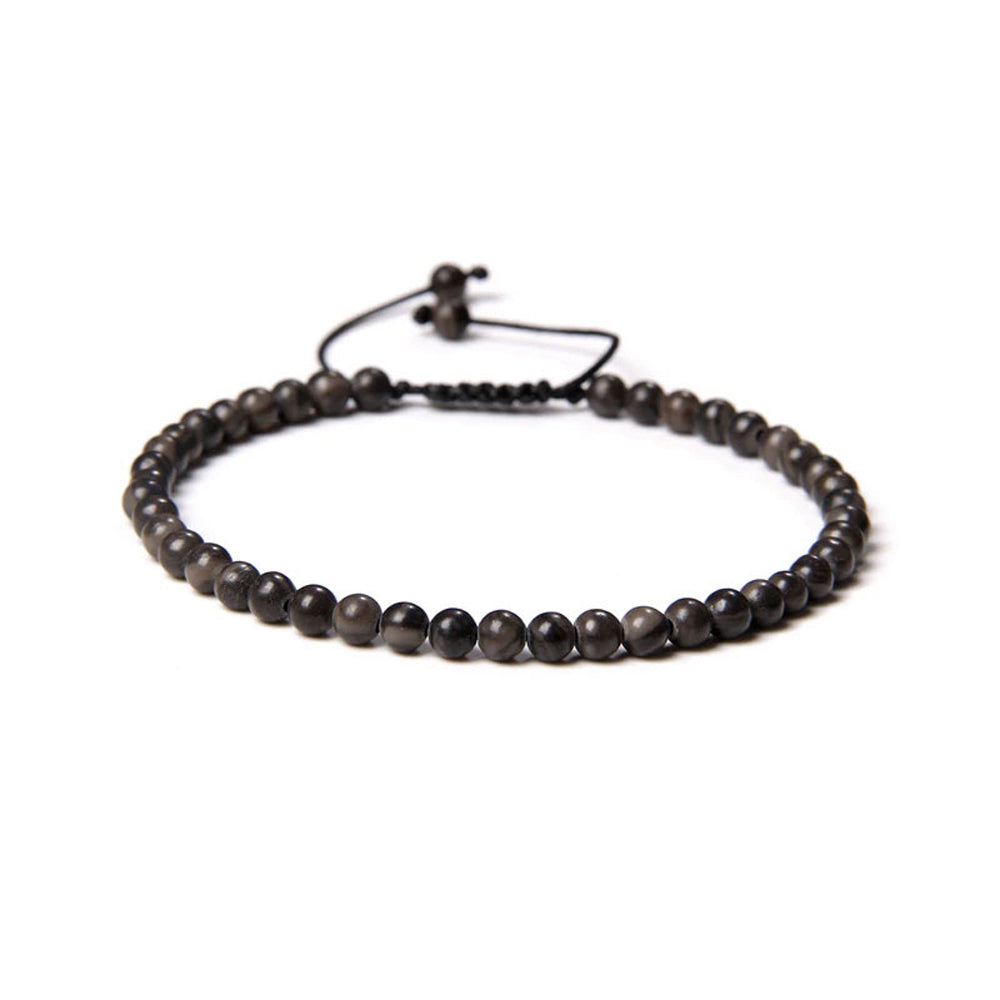 Bracciale in Legno Fossile – cordino regolabile con pietre di perline da 4 mm