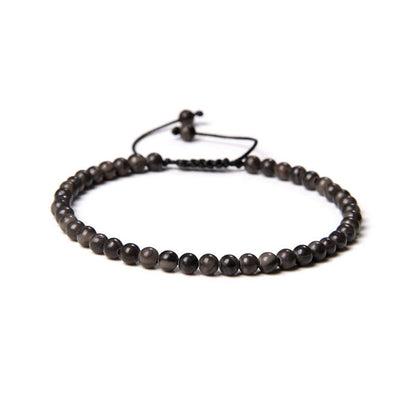 Bracciale in Legno Fossile – cordino regolabile con pietre di perline da 4 mm