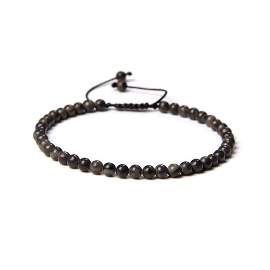Bracciale in Legno Fossile – cordino regolabile con pietre di perline da 4 mm