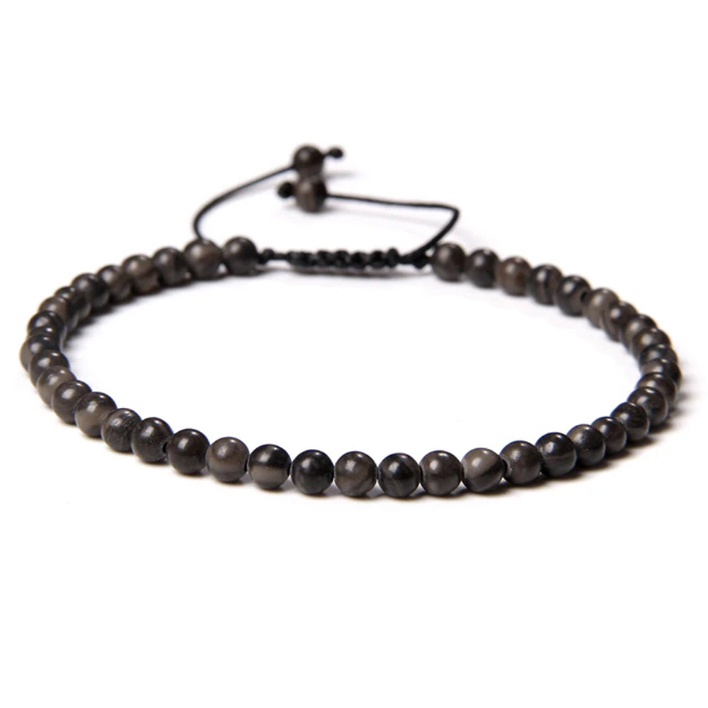 Bracciale in Legno Fossile – cordino regolabile con pietre di perline da 4 mm