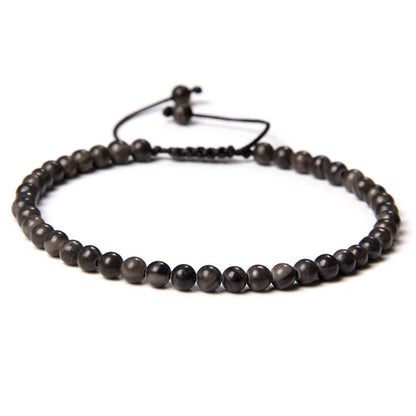 Bracciale in Legno Fossile – cordino regolabile con pietre di perline da 4 mm