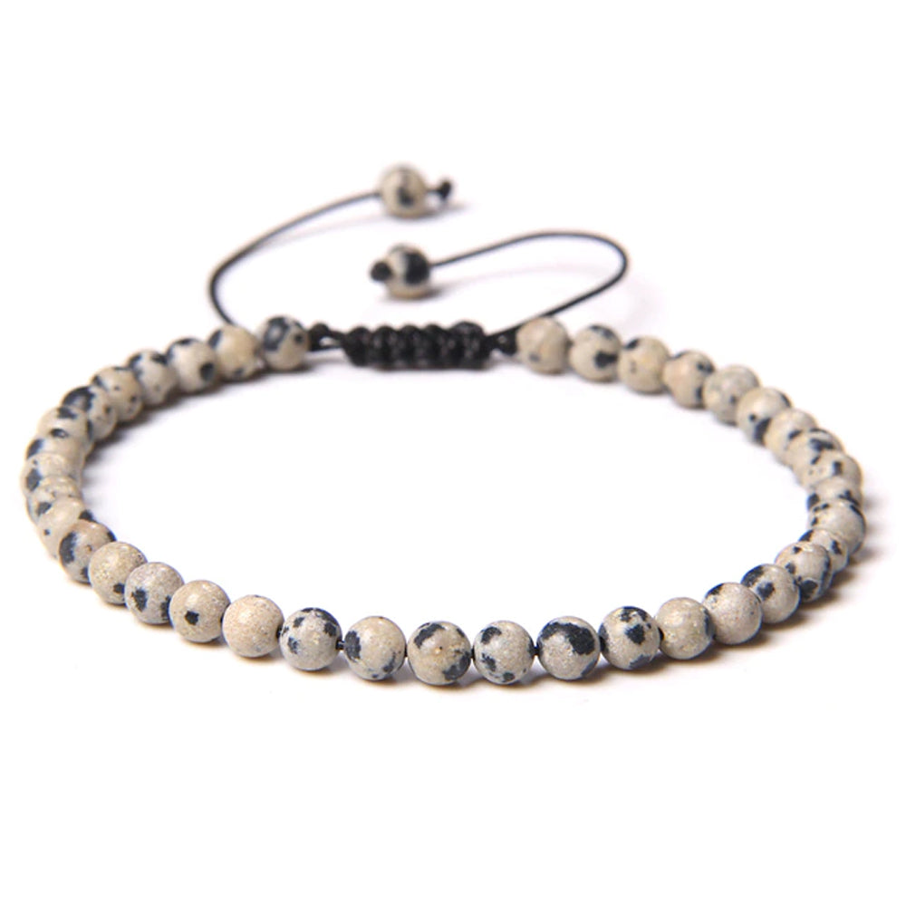Bracciale in Diaspro Dalmata – cordino regolabile con pietre sferiche da 4 mm