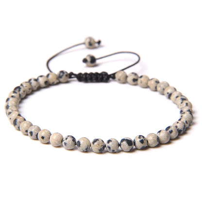 Bracciale in Diaspro Dalmata – cordino regolabile con pietre sferiche da 4 mm