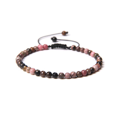 Bracciale in Rodocrosite – cordino regolabile con pietre sferiche