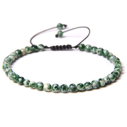 Bracciale serpentino scuro – cordino regolabile con pietre con perline da 4 mm